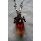 Колье с янтарем (3 см) в мельхиоре