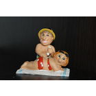 Декоративная, фарфоровая статуэтка "Пара на пляже".