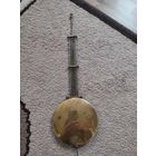 Маятник старинных настенных часов