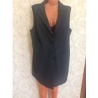 Жилет женский удлиненный на 56-58 размер. Отлично сидит на фигуре, состояние можно сказать нового. Длина 88 см, ПОгруди 61 см. Очень актуальная вещь в гардеробе.