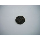 Древняя медная восточная монета.