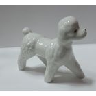Статуэтка фарфоровая "Собачка" 70-80-е годы Европа. Высота 9 см.