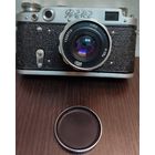 Советский дальномерный фотоаппарат ФЭД-2 с объективом Индустар-26м (И-26м) с фокусным расстоянием 52мм и максимальной диафрагмой f/2.8. в родном  чехле из кожи .