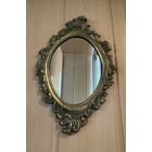 Зеркало в бронзовой рамке