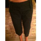 Стильные бриджи на 42 размер, черные в полоску, очень классно сидят на фигуре.