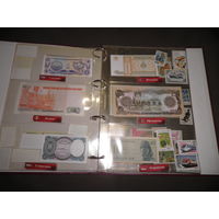 Папка Монеты и Банкноты на 20 листов и около 60 банкнот разных стран Мира.Новое!С рубля.
