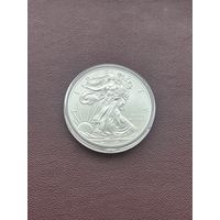 США 1 доллар 2012 года.  UNC "Американский серебряный орёл. Шагающая свобода"