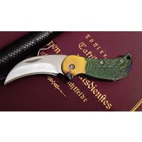 Нож брелок. Попугай. Не точен, отличный брелок для ключей.