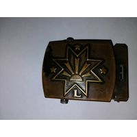 Пряжка ремня.