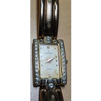 Позолоченные часы Romanson.