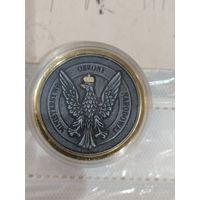 Монетовидный жетон вооруженных сил Польши.