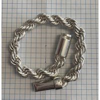 Браслет 875 пробы . Вес 82.3 грамма . Длина 24 см