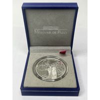 Французская серебряная монета номиналом 6,55957 франков 1999 года из серии Стили европейского искусства посвященная готике