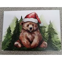 Открытка Мишка в новогоднем колпаке на фоне елок. Новый год. Чистая