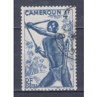 [1142] Французские колонии. Камерун 1946. Культура и быт.Охотник с.луком. Гашеная марка.