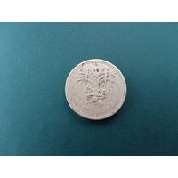 1 фунт Великобритания.