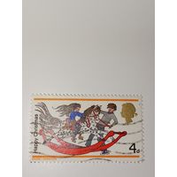 Великобритания 1968 На марке изображены дети, играющие с деревянной лошадкой-качалкой, типичной для 1880-х годов.