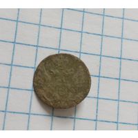 Ранняя, очень маленькая орлянка РИ, плоская и тонкая.