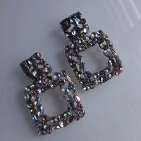 Крупные серьги - пуссеты. Вставки- Аврора Бориалис. Жёлтый металл. 6х4 см.