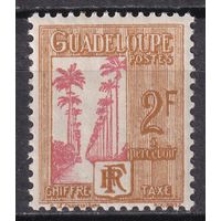 111.FrK. Франция. Колонии. Гваделупа. Доплатные марки. Палм - авеню в Капестерр - Бель. 1928 г. 2 Fr. Mi.#36.