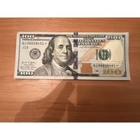 100 долларов США со здевздой