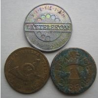 Жетоны телефона Латвии, Польши и Беларуси.