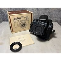 Фотоаппарат Зенит ЕТ с объективом Гелиос-44М-6 новый, в коробке, с документами.