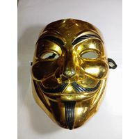 Карнавальная маска Гая Фокса (также известная как маска Анонимуса или Вендетта).