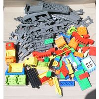 Части конструктора Lego Duplo примерно 125 деталей ( железная дорога и др. )