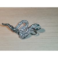 Металлическая брошь "Змея", с множеством вставок, размер 5*2.5 см.