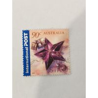 Марка из серии "Международные приветствия" - Звезда с подарками