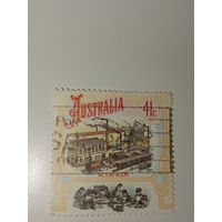 Австралия год 1990. Марка изображает Промышленный бум