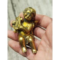 Ангелов,скорее всего гипс,с рубля