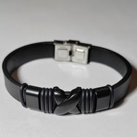 Браслет кожаный со стальной подвеской